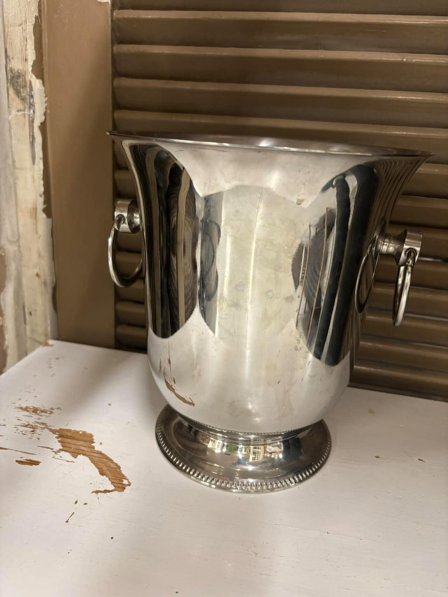 Blank champagnekøler i stål med ringgreb, mærket Guy Degrenne